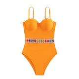 Maillot de bain une pièce à dos nu et patchwork contrasté 