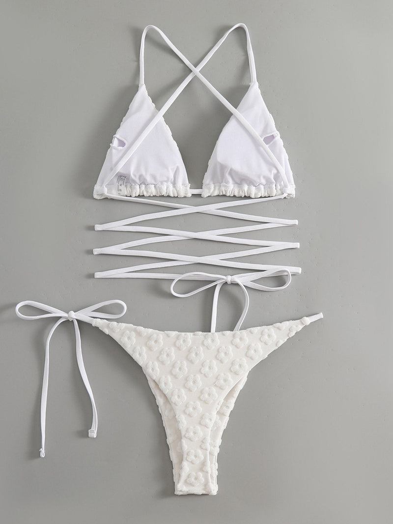 Traje de baño bikini con lazo en la espalda cruzada y textura de flores 
