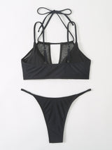 Traje de baño bikini liso con cuello halter y abertura de malla con lazo 