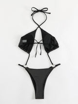 Traje de baño de una pieza con cuello halter cruzado y ahuecado con purpurina y anillo en O 