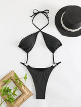 Traje de baño de una pieza con cuello halter cruzado y ahuecado con purpurina y anillo en O 