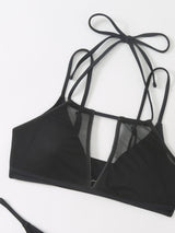 Traje de baño bikini liso con cuello halter y abertura de malla con lazo 